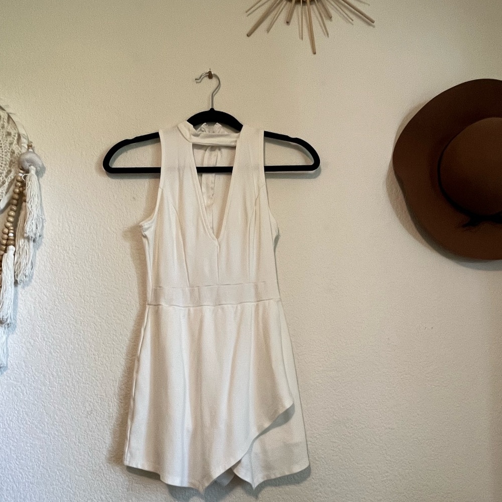 4/15$ Sexy White romper/jumpsuit
